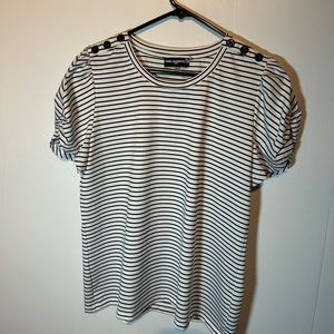 Striped top with short puffed-sleeves and decorative buttons on the shoulders.